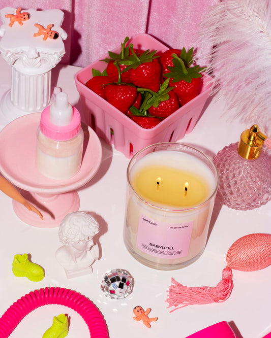 melanie martinez cry baby dupe candle by joocier candles called babydoll with notes of strawberry milk, lipstick, dark fruits, burnt caramel, woods, and more